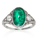 AN ART DECO EMERALD AND DIAMOND RING in white gold or platinum, designed as an elongated oval