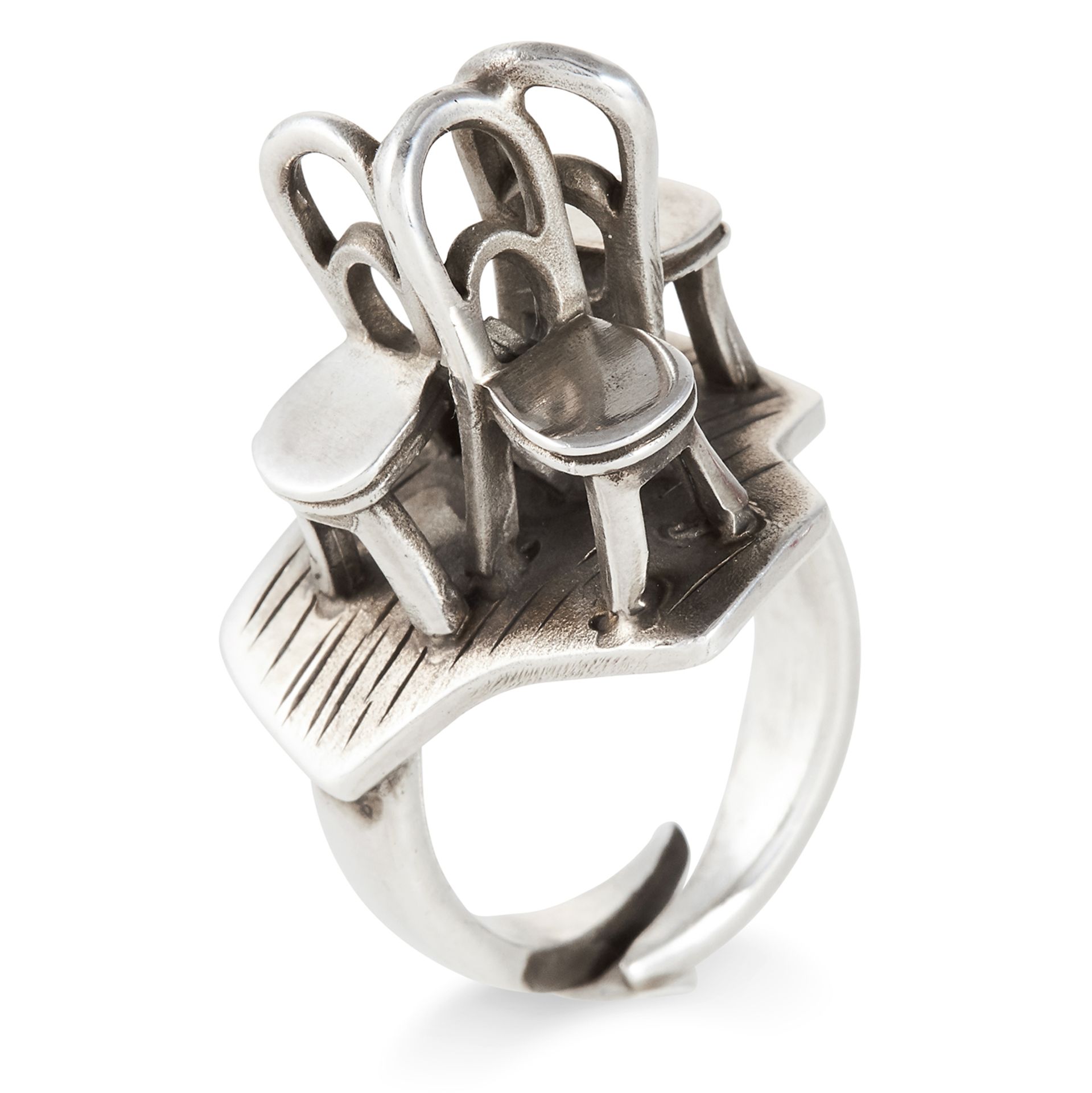 A 'BEDROOM CHAIRS' RING, OLE BENT PETERSEN FOR GEORG JENSEN CIRCA 1978 in silver, signed Georg