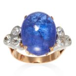 A 25.46 CARAT CEYLON SAPPHIRE CABOCHON AND DIAMOND RING in high carat yellow and white gold, set