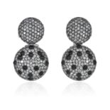 A PAIR OF DIAMOND AND ONYX EARRINGS in 18ct white gold, each comprising of two circular faces