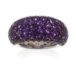 AN AMETHYST DRESS RING in 18ct white gold, jewelled with round cut amethyst totalling