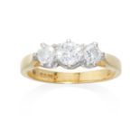 A DIAMOND THREE STONE RING in 18ct yellow gold, set with three round cut diamonds totalling