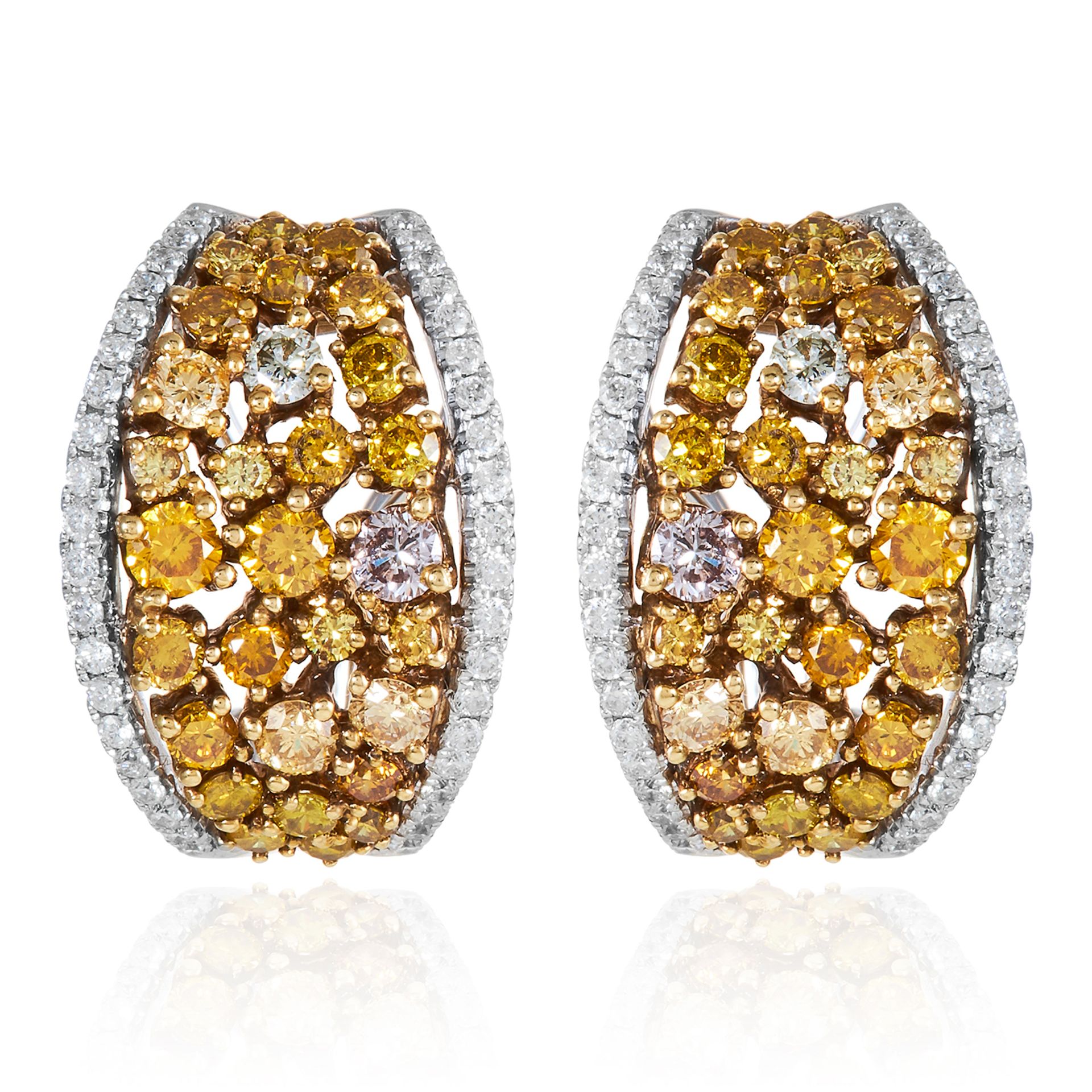 A PAIR OF YELLOW AND WHITE DIAMOND EARRINGS in 18ct white gold, jewelled with round cut yellow and