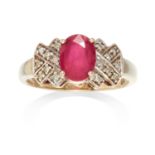 A RUBY GEMSET DRESS RING in 9ct yellow gold, set with a central oval cut ruby, stamped 9K, size O /