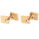 A PAIR OF VINTAGE CUFFLINKS, CARTIER in high carat yellow gold, the textured, square links connected