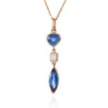 A SAPPHIRE AND DIAMOND PENDANT in 18ct gold, comprising of a marquise cut and pear cut sapphire