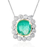 A 10.75 COLOMBIAN EMERALD AND DIAMOND PENDANT in high carat yellow and white gold/ platinum,