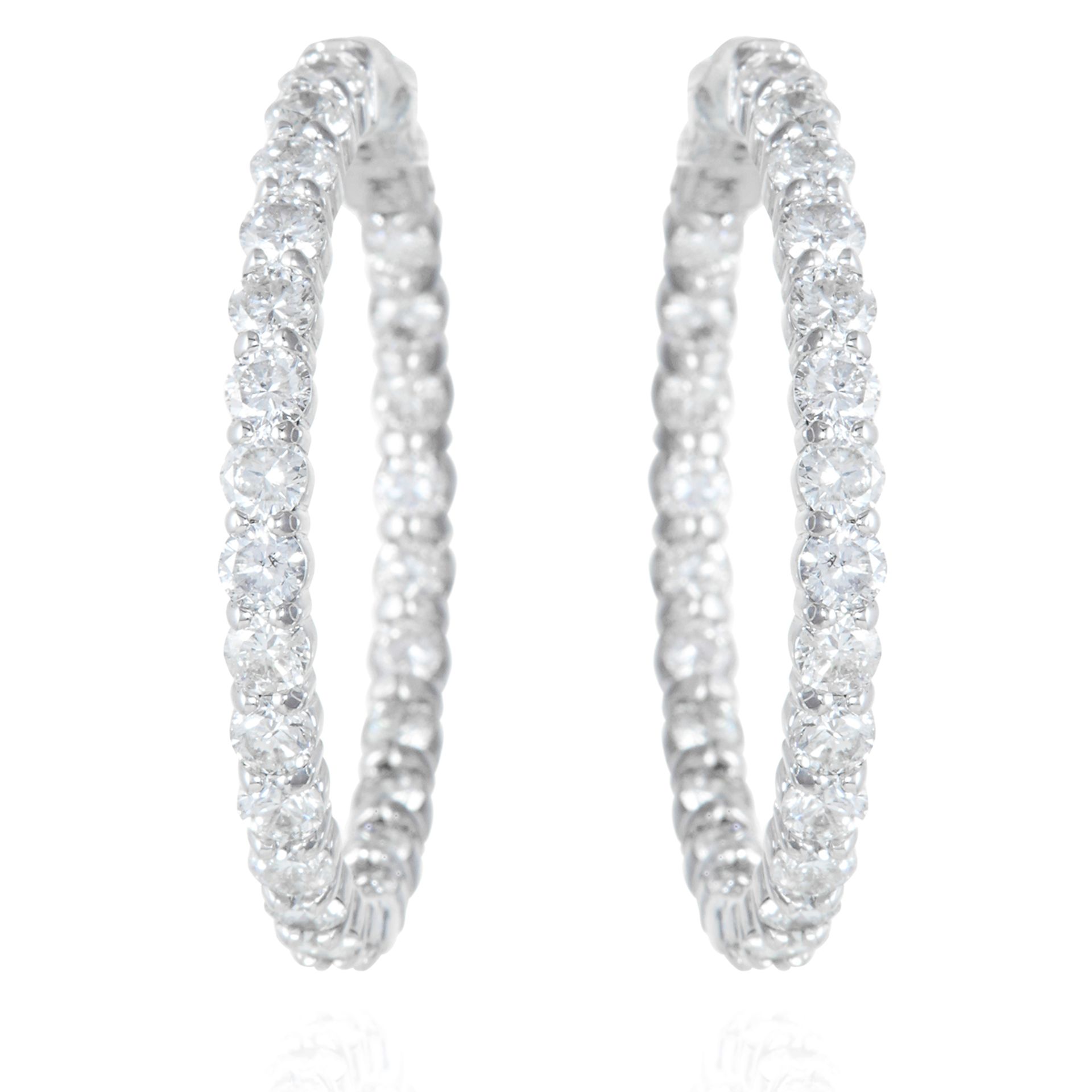 A PAIR OF 5.0 CARAT DIAMOND HOOP EARRINGS in white gold, the full hoops jewelled with round cut