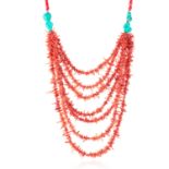 A CORAL TWIG AND TURQUOISE BEAD NECKLACE seven strands of coral suspended from a coral and turquoise