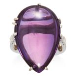 AN AMETHYST AND DIAMOND DRESS RING in white gold or platinum, set with a large pear shaped