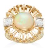 AN OPAL AND DIAMOND RING, RUDOLF FELDMAN 1940s in yellow gold, the circular oval cabochon between