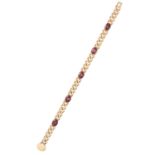 AN ANTIQUE GARNET BRACELET in yellow gold, formed of curb link bracelet jewelled with five oval