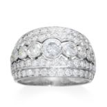 A DIAMOND DRESS RING in platinum, set with five rows of graduated round cut stones, French marks,