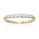 A DIAMOND HALF ETERNITY RING in 18ct yellow gold, jewelled with round cut diamonds totalling