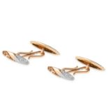 A PAIR OF ANTIQUE CUFFLINKS in 15ct yellow gold, the oval faces with floral engraving, full