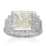 A 3.24 CARAT DIAMOND DRESS RING in 18ct white gold, in Art Deco design, set with a central