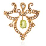 AN ANTIQUE PERIDOT AND PEARL BROOCH in 15ct yellow gold, in scrolling and foliate motif jewelled