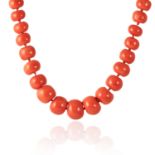 AN ANTIQUE CORAL AND TURQUOISE NECKLACE in yellow gold, comprising a row of sixty six graduated,