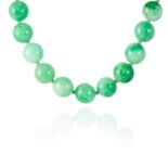 A JADEITE JADE BEAD NECKLACE comprising a row of thirty-five polished jadeite beads of approximately