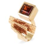 AN ABSTRACT CITRINE DRESS RING, DANISH CIRCA 1970 in yellow gold, the incomplete band terminated