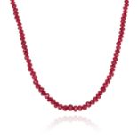 A SUITE OF EMERALD, RUBY AND SAPPHIRE BEAD NECKLACES comprising of a faceted emerald bead