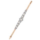 AN ANTIQUE DIAMOND AND PEARL BRACELET in yellow gold and silver or platinum, jewelled with seven