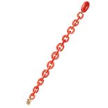 AN ANTIQUE CORAL BRACELET in yellow gold, formed of graduated polished links, 17.5cm, 9.9g.