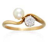 AN ANTIQUE PEARL AND DIAMOND TOI ET MOI RING in high carat yellow gold, set with a pearl and old cut