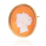 AN ANTIQUE CARVED CAMEO BROOCH in high carat yellow gold, depicting the bust of a lady, finely