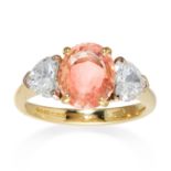 A CEYLON NO HEAT PADPARADSCHA SAPPHIRE AND DIAMOND RING in 18ct yellow gold, the oval cut 3.02 carat