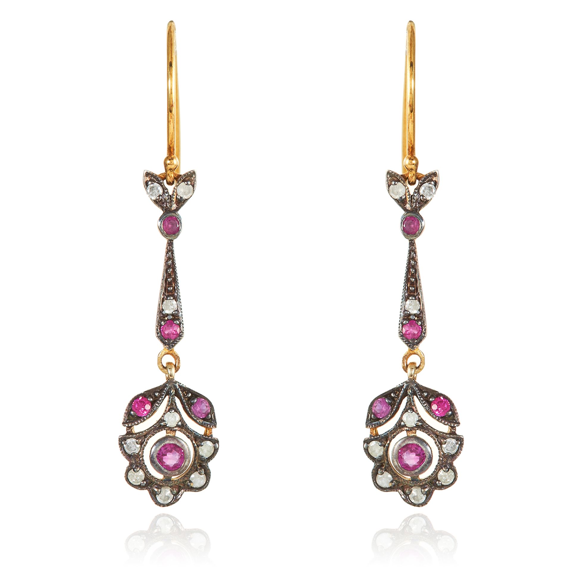 A PAIR OF RUBY AND DIAMOND EARRINGS in gold and silver, each cluster suspended below a jewelled