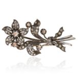AN ANTIQUE DIAMOND FLOWER BROOCH, 19TH CENTURY in yellow gold and silver, jewelled with rose cut