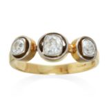 AN ART DECO THREE STONE DIAMOND RING in 18ct yellow gold and platinum, the three old cut diamonds