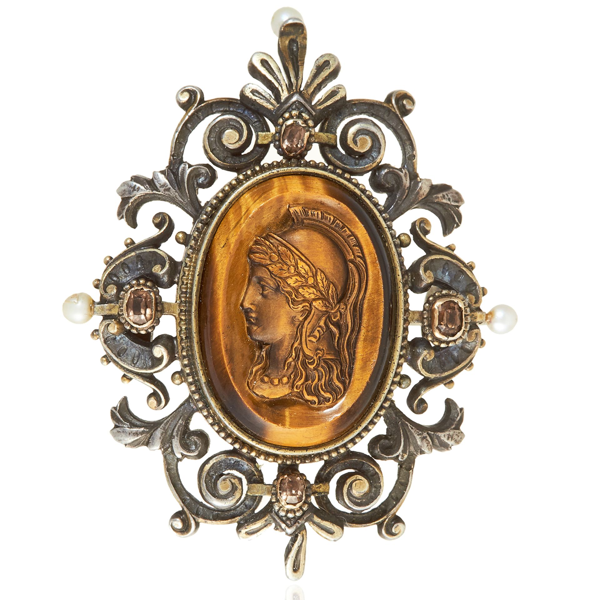 AN ANTIQUE JEWELLED CARVED CAMEO BROOCH, 19TH CENTURY in silver, the tiger's eye carved cameo
