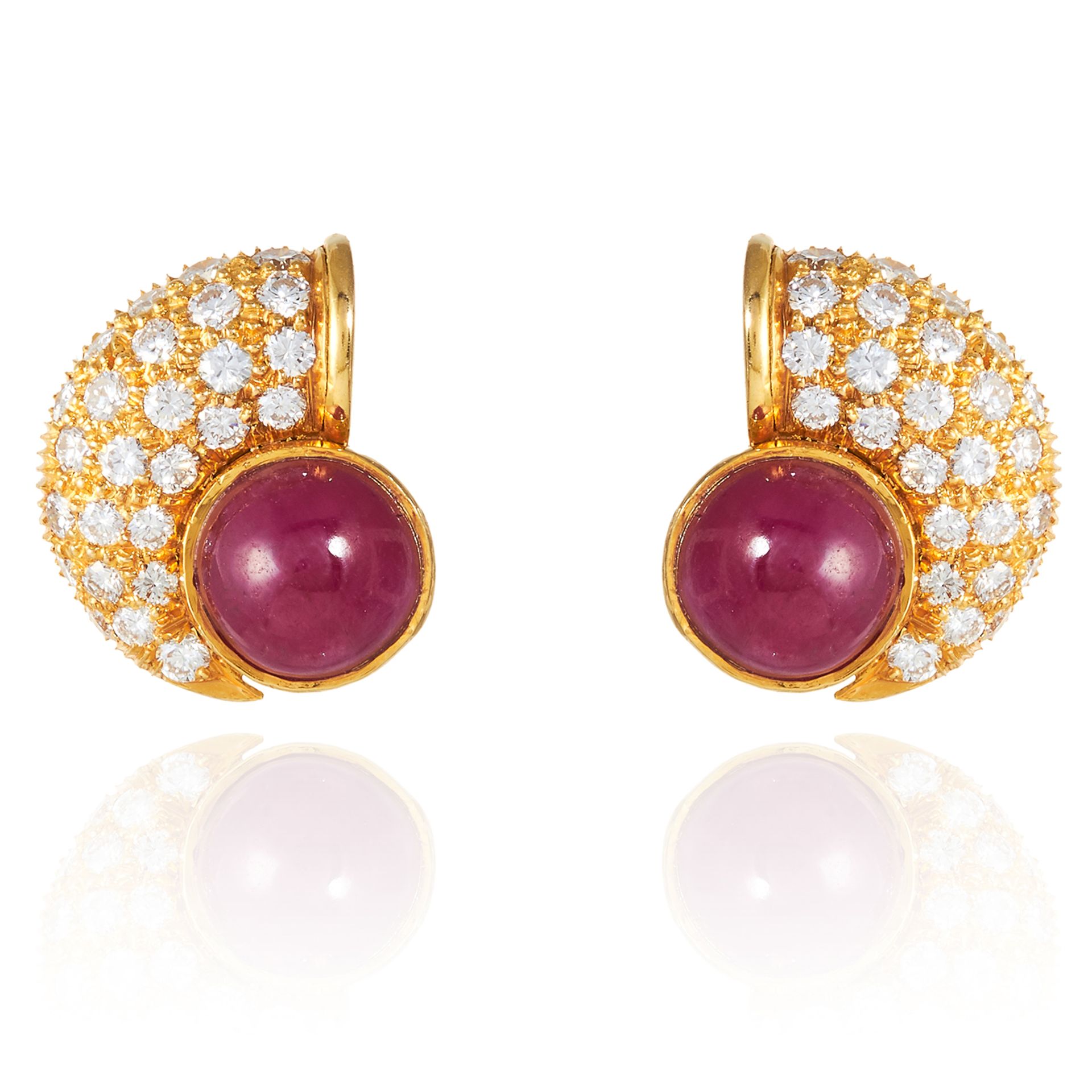 A PAIR OF RUBY AND DIAMOND EARRINGS in high carat yellow gold, each comprising of a cabochon ruby in