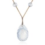 A ROCK CRYSTAL NECKLACE comprising of six faceted rock crystal beads suspending a large faceted rock