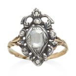 AN ANTIQUE DIAMOND RING, EARLY 19TH CENTURY in yellow gold and silver, set with rose cut diamonds,