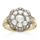 AN ANTIQUE DIAMOND CLUSTER RING, 19TH CENTURY in yellow gold and silver, formed of concentric rows