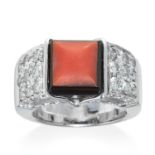 AN ANTIQUE CORAL, ONYX AND DIAMOND RING in 18ct white gold, stamped 750, size J / 5, 12.5g.