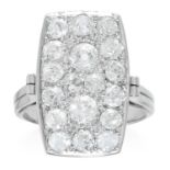 AN ART DECO DIAMOND RING in platinum or white gold, the rectangular face jewelled with old cut