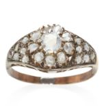 AN ANTIQUE DIAMOND CLUSTER RING in yellow gold, set with rose cut diamonds, unmarked, size N / 7,