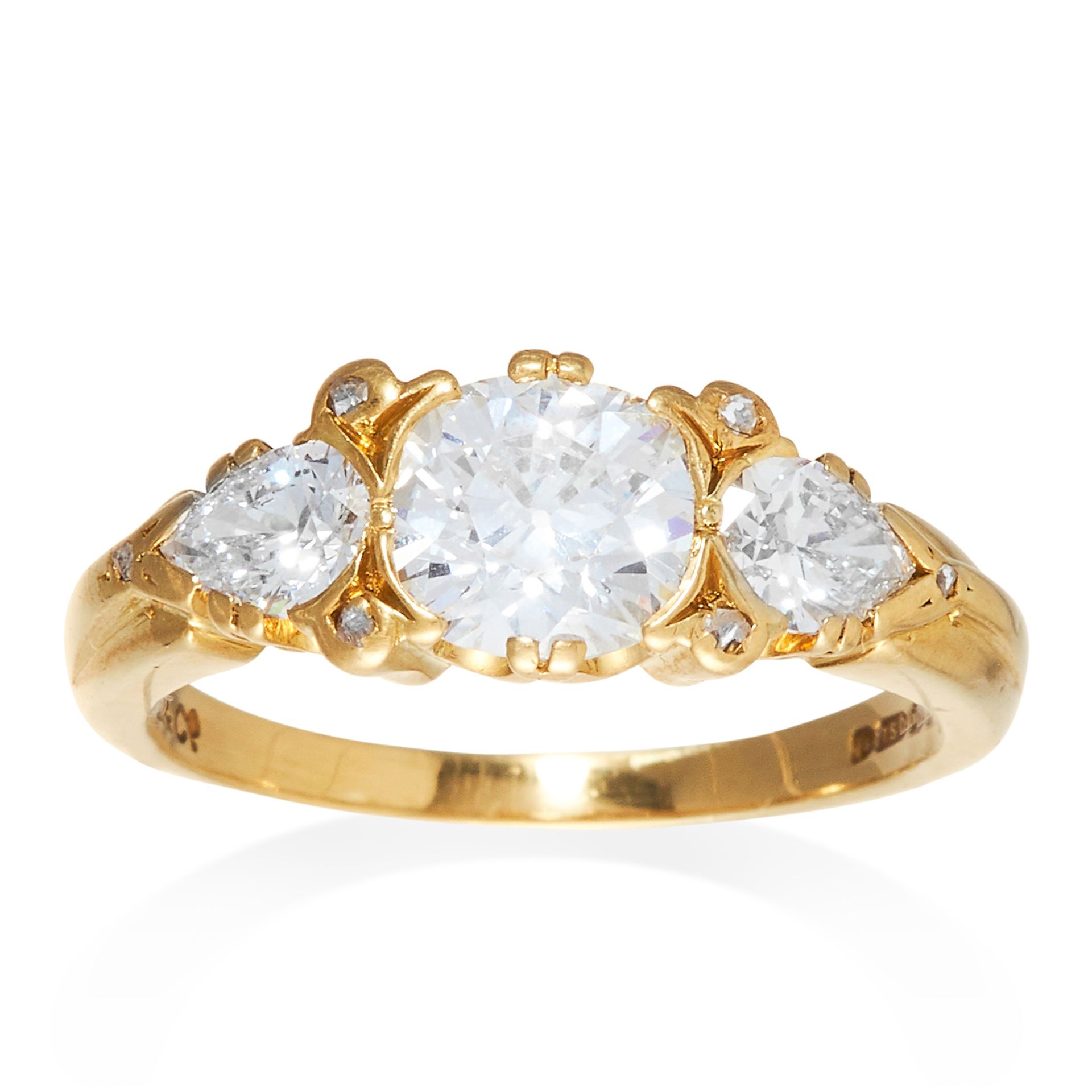 AN 2.20 CARAT DIAMOND RING in 18ct yellow gold, central 1.30 carat old cut diamond, between pear cut