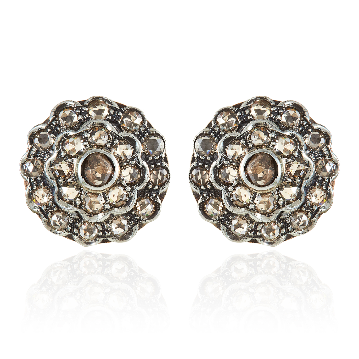 A PAIR OF DIAMOND CLUSTER EARRINGS in yellow gold and silver, formed of concentric rows of rose