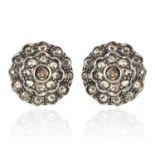 A PAIR OF DIAMOND CLUSTER EARRINGS in yellow gold and silver, formed of concentric rows of rose