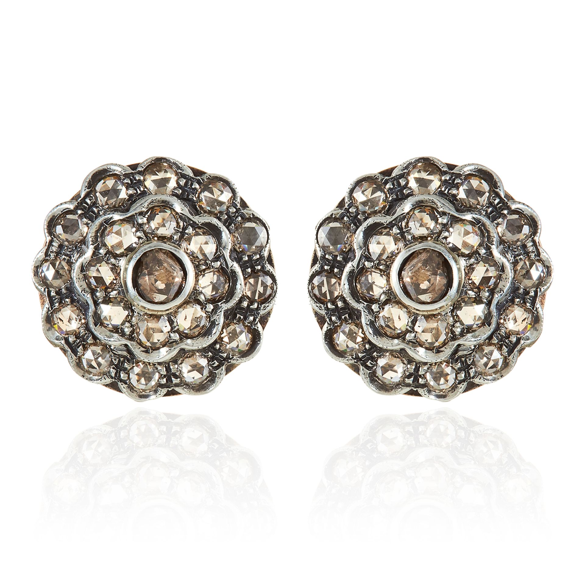 A PAIR OF DIAMOND CLUSTER EARRINGS in yellow gold and silver, formed of concentric rows of rose