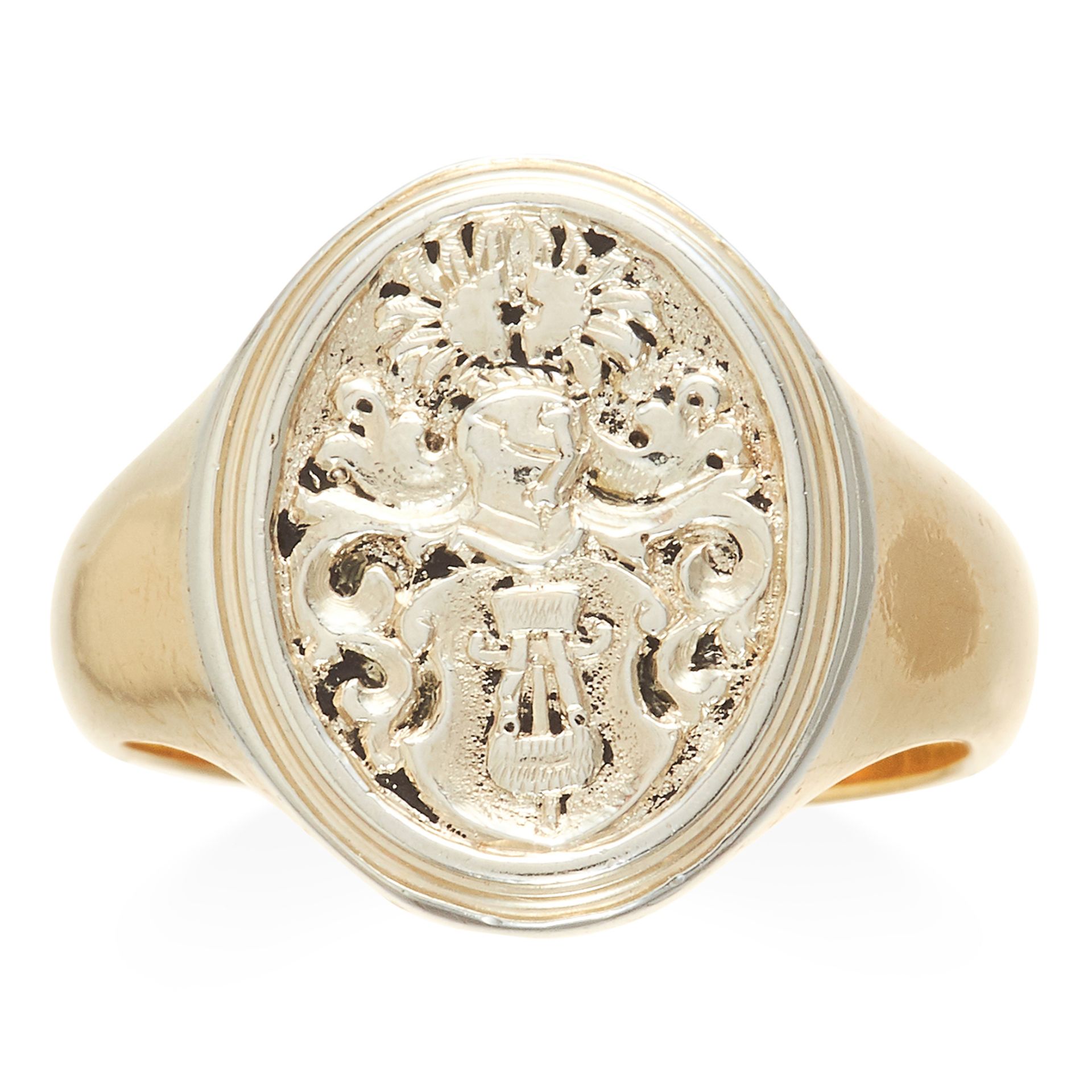 AN INTAGLIO SEAL SIGNET RING in 18ct yellow gold and platinum, the oval face with high relief