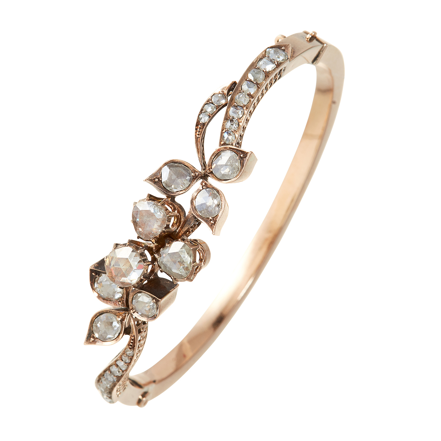 AN ANTIQUE DIAMOND BANGLE, 19TH CENTURY in high carat yellow gold, the foliate motif jewelled with