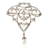 AN ANTIQUE PEARL AND DIAMOND BROOCH in yellow gold and silver, the principal 0.50 carat old cut