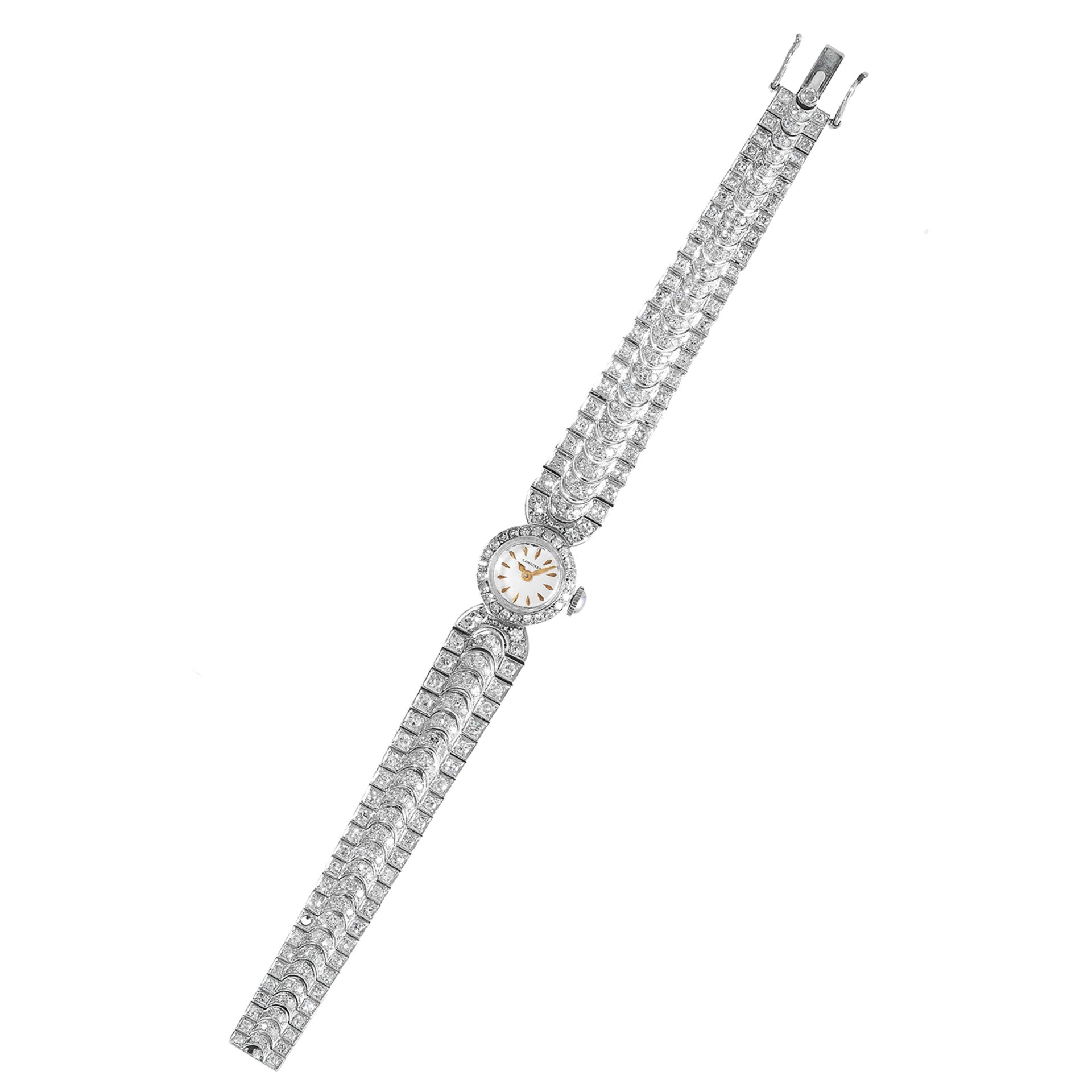 A DIAMOND JEWELLED WATCH, LONGINES in platinum, the strap jewelled with round cut diamonds with