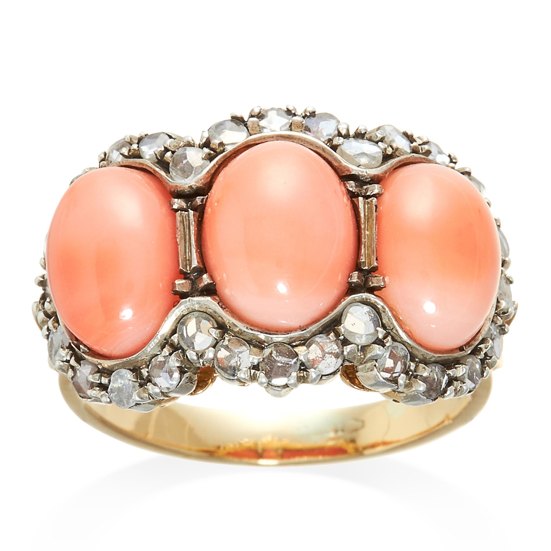 A CORAL AND DIAMOND RING, CIRCA 1940 in 18ct yellow gold, the three coral cabochons encircled by